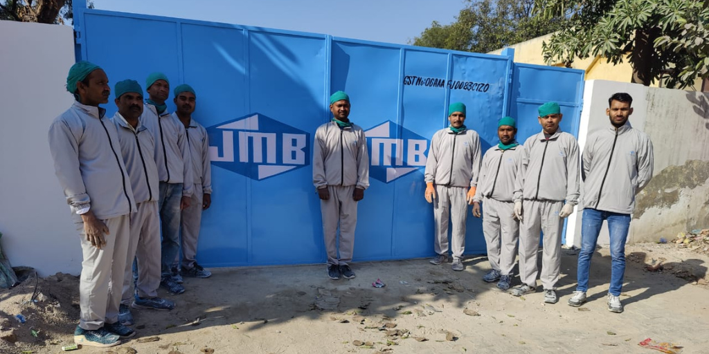 The J. Mitra & Bros. team at the Sonepat factory gate